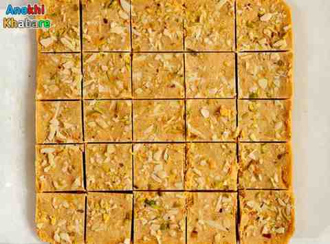 Anokhikhabare.com,Besan Barfi Recipe,Cutting and Serving the Burfi